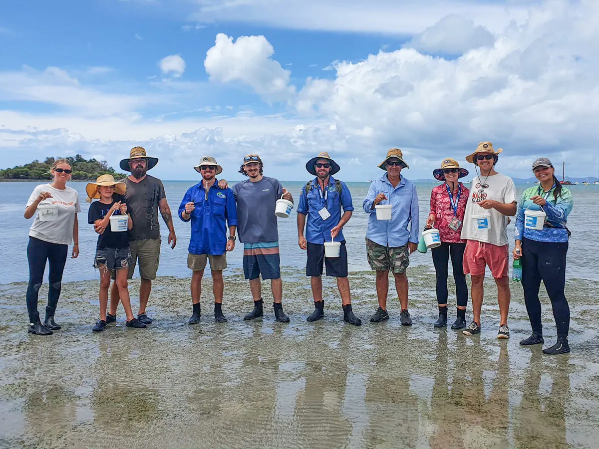 Volunteers at a flower collection day on the shore
